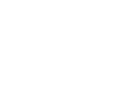 Zebra compared in height to a refrigerator