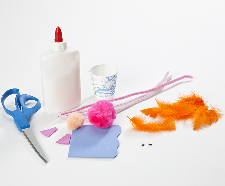 Materials: red or orange feathers, chenille stems, pom-poms, googly eyes, scissors, glue, tape, small cup